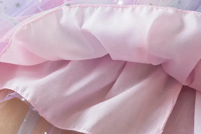 Déguisement robe licorne étoilée multicolore pour petite fille détails tissus